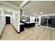 Stylish kitchen showcasing an open layout with a large island and modern cabinetry at 22504 W Meade Ln, Buckeye, AZ 85326