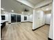 Bright living space with a ceiling fan, recessed lighting, and a sliding glass door to the outside at 22504 W Meade Ln, Buckeye, AZ 85326