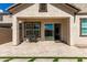 Outdoor patio featuring modern BBQ, tiled flooring, and backyard views at 2716 S Chatsworth --, Mesa, AZ 85209