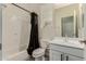 Bright bathroom with tub/shower combo and a vanity sink at 2716 S Chatsworth --, Mesa, AZ 85209