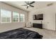 Bright and airy bedroom with multiple windows and a ceiling fan at 2716 S Chatsworth --, Mesa, AZ 85209