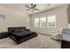 Neutral Primary bedroom with a ceiling fan, a platform bed and a sitting area at 2716 S Chatsworth --, Mesa, AZ 85209