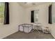 Neutral Bedroom with a crib, modern baby soother, and cozy carpeting at 2716 S Chatsworth --, Mesa, AZ 85209
