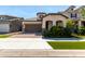 Charming single-Gathering home showcasing a well-kept yard and inviting front entrance at 2716 S Chatsworth --, Mesa, AZ 85209