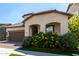 Inviting home with neat landscaping, covered entrance, and brick-paved driveway at 2716 S Chatsworth --, Mesa, AZ 85209