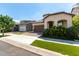 Well-manicured lawn and beautiful landscaping add charm to this lovely home's exterior at 2716 S Chatsworth --, Mesa, AZ 85209