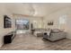 Spacious living room showcasing a large sectional sofa and patio access at 2716 S Chatsworth --, Mesa, AZ 85209