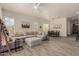 Open-concept living area showcasing a comfortable sectional sofa and dining set at 2716 S Chatsworth --, Mesa, AZ 85209