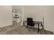 Office/bedroom featuring work desk, modern chair, and neutral carpet at 2716 S Chatsworth --, Mesa, AZ 85209