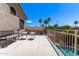 This outdoor balcony is perfect for relaxing with wrought iron details and a view of the community pool at 3089 E Indigo Bay Dr, Gilbert, AZ 85234