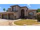 Two-story home with a well manicured front yard at 3089 E Indigo Bay Dr, Gilbert, AZ 85234