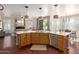 Open kitchen with a large island, stainless steel appliances, and seamless flow to the dining area at 3089 E Indigo Bay Dr, Gilbert, AZ 85234