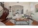 Inviting living room with high ceilings, staircase, and stylish decor at 3089 E Indigo Bay Dr, Gilbert, AZ 85234
