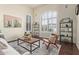 Open living room area with two large arched windows at 3089 E Indigo Bay Dr, Gilbert, AZ 85234
