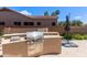 Outdoor kitchen featuring a built-in grill, drawers, and countertop space for cooking at 3089 E Indigo Bay Dr, Gilbert, AZ 85234