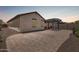 Paver backyard featuring a built-in grill and pergola, perfect for outdoor living and entertaining at 31219 N 6Th Pl, Phoenix, AZ 85085
