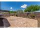 Paver backyard featuring a built-in grill and pergola and block wall, perfect for outdoor living at 31219 N 6Th Pl, Phoenix, AZ 85085