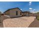 Paver backyard featuring a built-in grill and pergola, perfect for outdoor living and entertaining at 31219 N 6Th Pl, Phoenix, AZ 85085