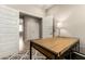 Home office with a minimalist desk with lots of natural light and a view of the closet and bedroom at 31219 N 6Th Pl, Phoenix, AZ 85085