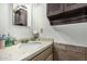 Bathroom featuring a vanity with a sink and decorative storage at 3208 W Wagoner Rd, Phoenix, AZ 85053