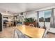 Bright dining area features tile floors, large window, and an aquarium at 3208 W Wagoner Rd, Phoenix, AZ 85053