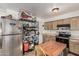 Well-equipped kitchen area with laminate countertops and updated appliances at 3208 W Wagoner Rd, Phoenix, AZ 85053