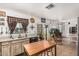Functional kitchen featuring laminate countertops, oak cabinets, with room for dining at 3208 W Wagoner Rd, Phoenix, AZ 85053