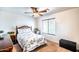 Bright bedroom featuring carpet and a double bed with ceiling fan at 3511 W Allens Peak Dr, San Tan Valley, AZ 85144