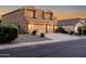Charming two-story home with a well-maintained yard and a two-car garage at 3511 W Allens Peak Dr, San Tan Valley, AZ 85144