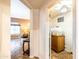 View into a laundry room, showcasing practical storage solutions, neutral tones, and functional appliances at 3511 W Allens Peak Dr, San Tan Valley, AZ 85144