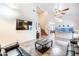 Spacious living room with tall ceilings, tile flooring, and an open layout for entertaining at 3511 W Allens Peak Dr, San Tan Valley, AZ 85144