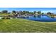 Scenic pond surrounded by lush greenery, showcasing the beautiful San Tan Heights community at 3511 W Allens Peak Dr, San Tan Valley, AZ 85144