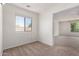 Bedroom with neutral carpet and a bright window at 37911 N Luke Ln, San Tan Valley, AZ 85140