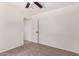 Bedroom features neutral carpet and a bright window at 37911 N Luke Ln, San Tan Valley, AZ 85140