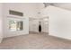 Bright and spacious living room with tall ceilings, neutral paint, and lots of light at 37911 N Luke Ln, San Tan Valley, AZ 85140