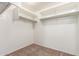 Walk-in closet with shelving and rod system at 37911 N Luke Ln, San Tan Valley, AZ 85140