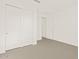 Carpeted bedroom with closet and recessed ceiling light at 3845 N Camden Dr, Florence, AZ 85132