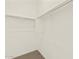 A simple, functional closet space with shelving for organization and storage at 3845 N Camden Dr, Florence, AZ 85132