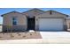 Charming single-story home featuring a two-car garage, low-maintenance landscaping, and a welcoming entrance at 3845 N Camden Dr, Florence, AZ 85132