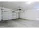 Spacious two car garage with ample room for parking and storage at 41279 W Elm Dr, Maricopa, AZ 85138