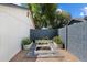 Backyard garden beds with brick paver and privacy wall, offering a tranquil outdoor space at 4136 E Eugie Ave, Phoenix, AZ 85032