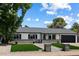 Charming single-story home featuring a landscaped front yard and stone accents at 4136 E Eugie Ave, Phoenix, AZ 85032