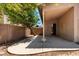 Covered back patio area offering a perfect outdoor retreat, ideal for relaxation and entertainment at 42458 W Desert Fairways Dr, Maricopa, AZ 85138
