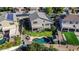 An aerial view of a home showcasing the backyard pool, landscaping, and surrounding neighborhood at 4408 W Summerside Rd, Laveen, AZ 85339