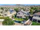 Aerial shot of backyard with patio, shed, pool, and mountain views in this well-kept neighborhood at 4408 W Summerside Rd, Laveen, AZ 85339