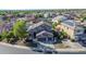 Beautiful two-story home with a three-car garage, mature landscaping, and a well-manicured front yard at 4408 W Summerside Rd, Laveen, AZ 85339