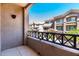 Cozy balcony offers views of the building's exterior and surrounding greenery at 4465 E Paradise Village S Pkwy # 1224, Phoenix, AZ 85032
