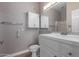 Bathroom featuring white cabinets, a large mirror, and a toilet with a tiled floor at 4465 E Paradise Village S Pkwy # 1224, Phoenix, AZ 85032