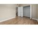 Bedroom with a closet, and sleek wood-look flooring at 4465 E Paradise Village S Pkwy # 1224, Phoenix, AZ 85032