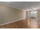 Bright and airy living room featuring a sliding glass door and attractive and durable laminate flooring at 4465 E Paradise Village S Pkwy # 1224, Phoenix, AZ 85032